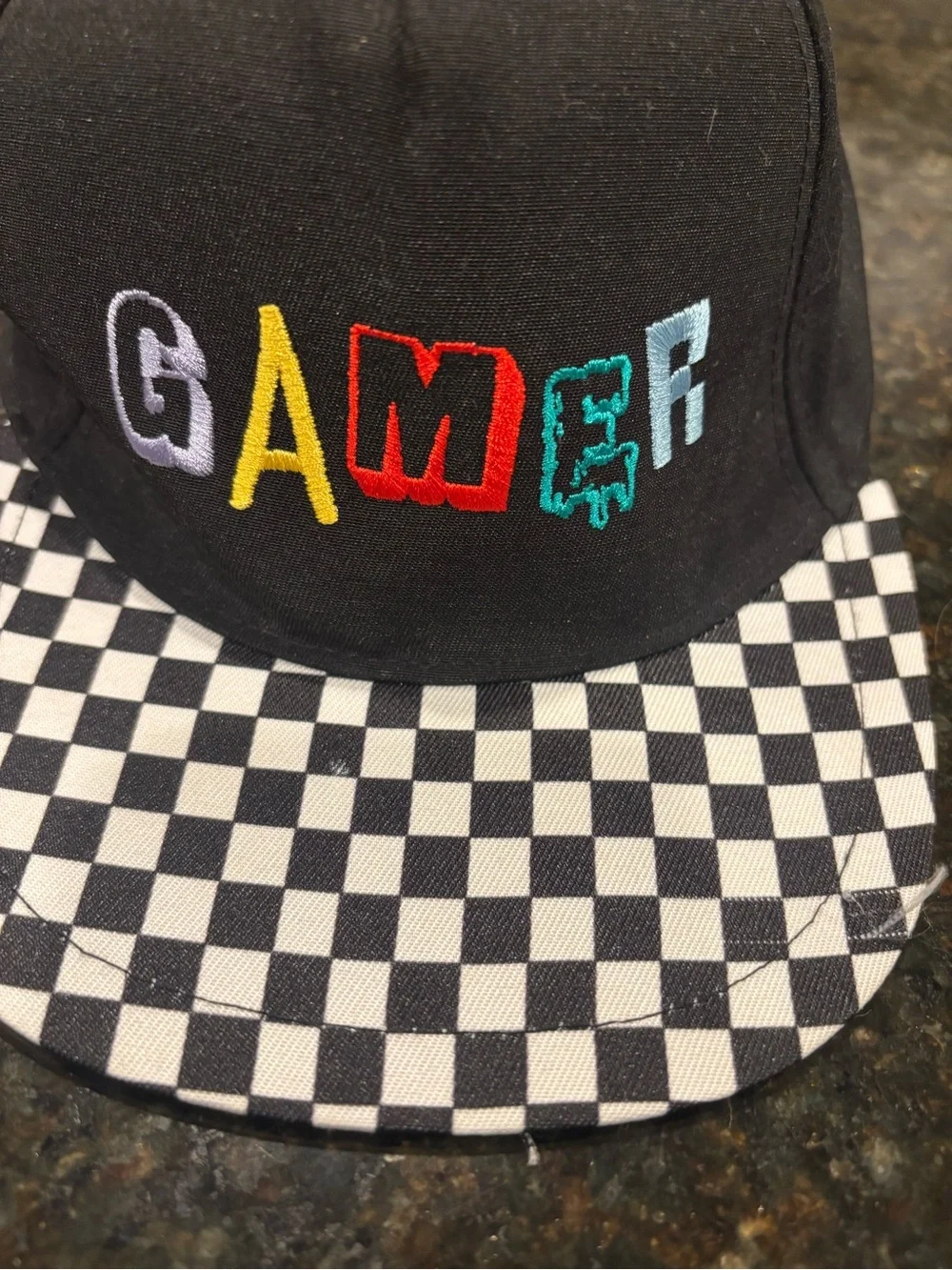Head Black Snapback Hat with Multicolor 'GAMER' Embroidery and Checkerboard Brim